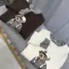 Пуловер с мече и кариран акцент